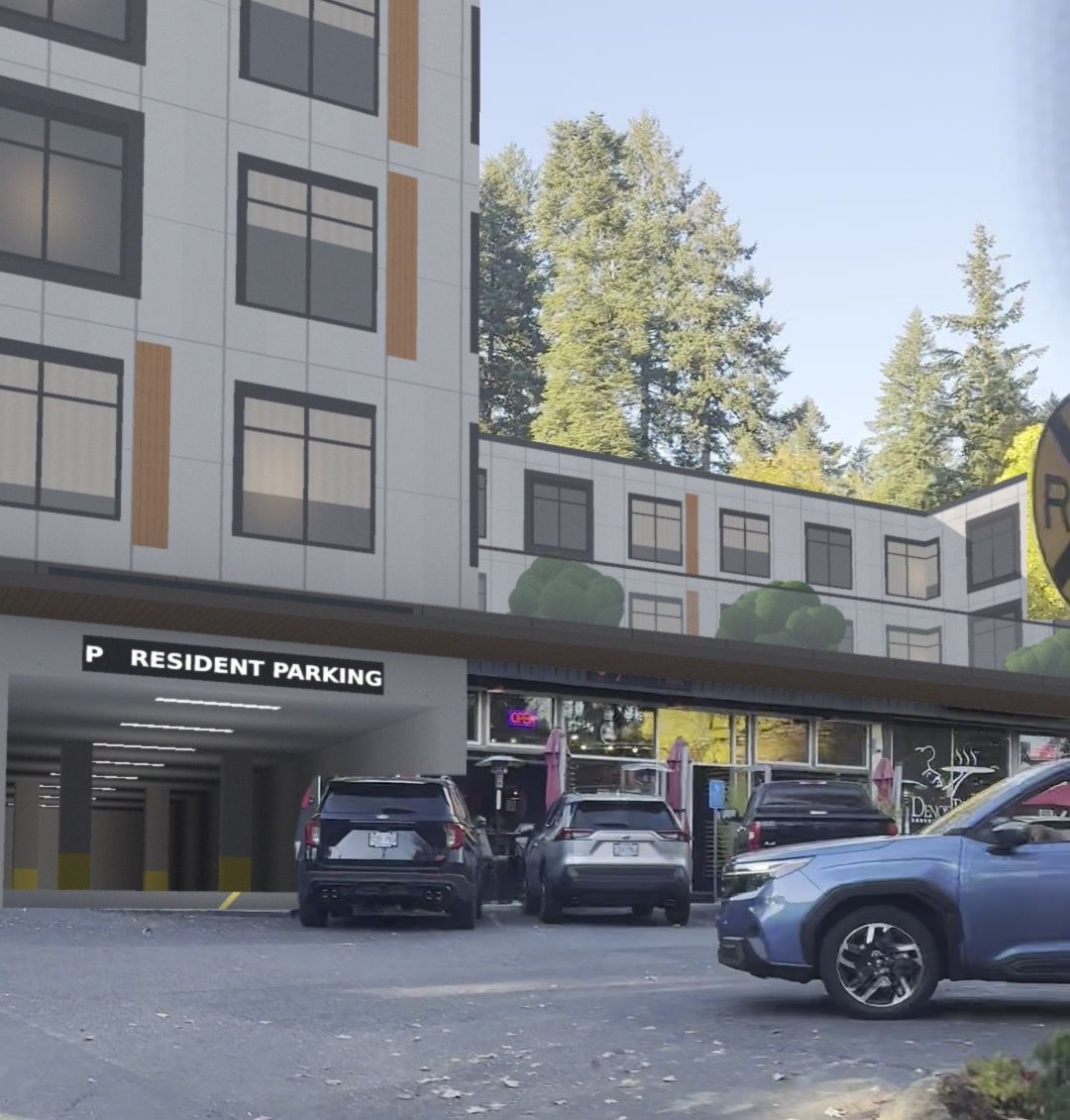 The same view with the proposed four-story building, a steel canopy over the shops and a resident parking entrance